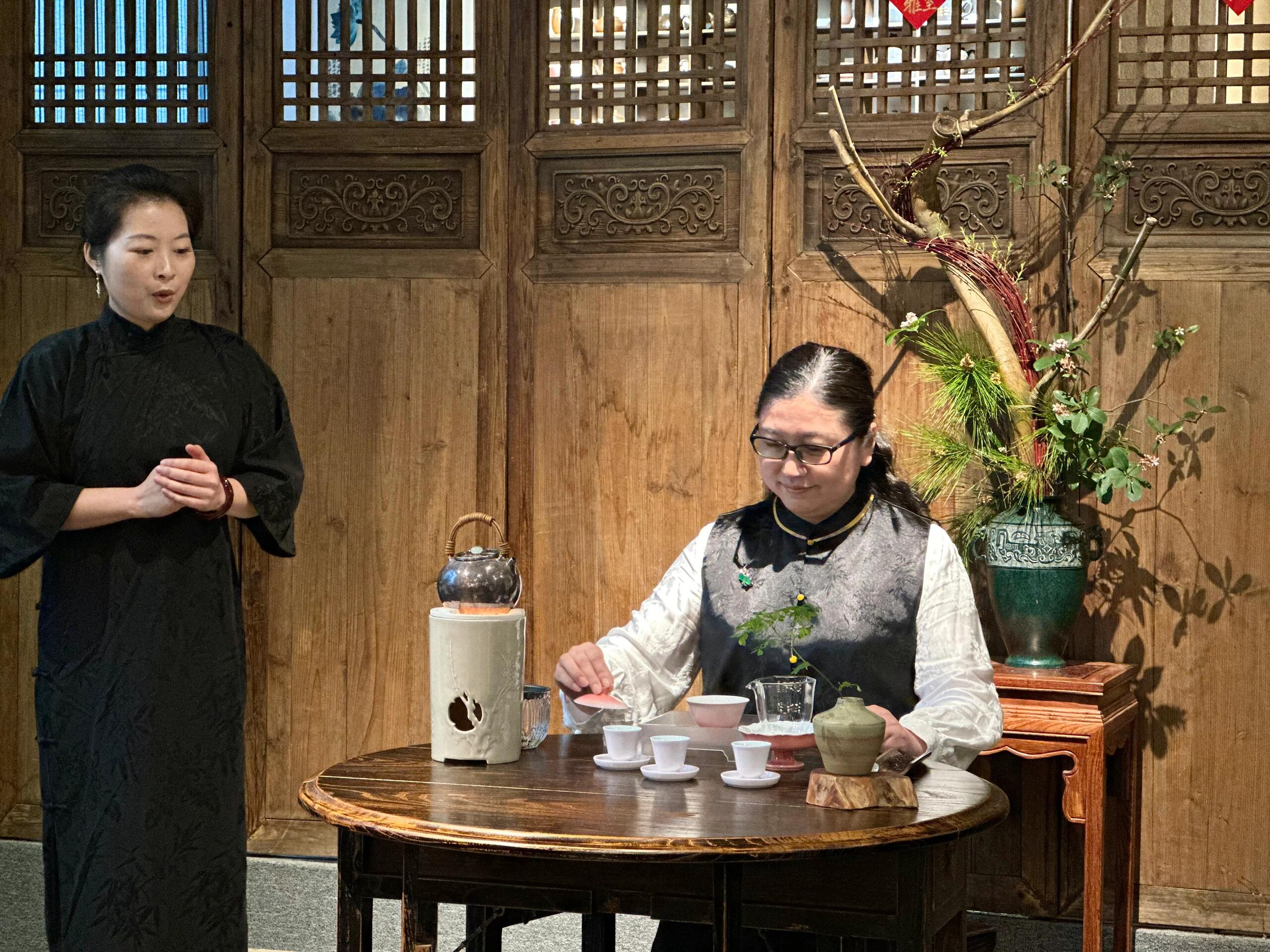 Travelers enjoying a Chinese tea appreciation experience